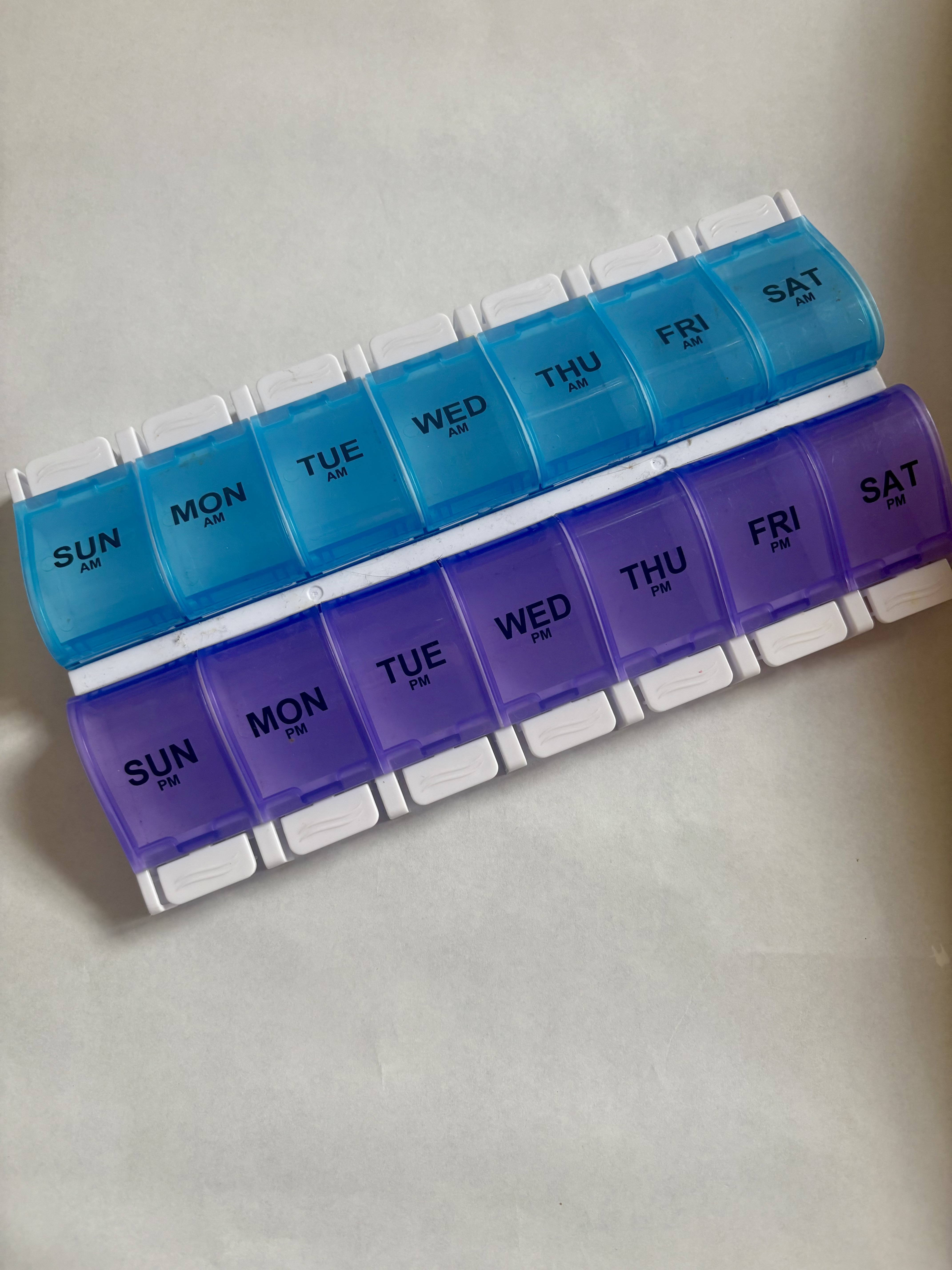 Ezy Dose Weekly (7-Day) AM/PM Pill Organizer, Vitamin and Medicine Box, Small Pop-out Compartments, 2 Times a Day, Blue and Purple Lids