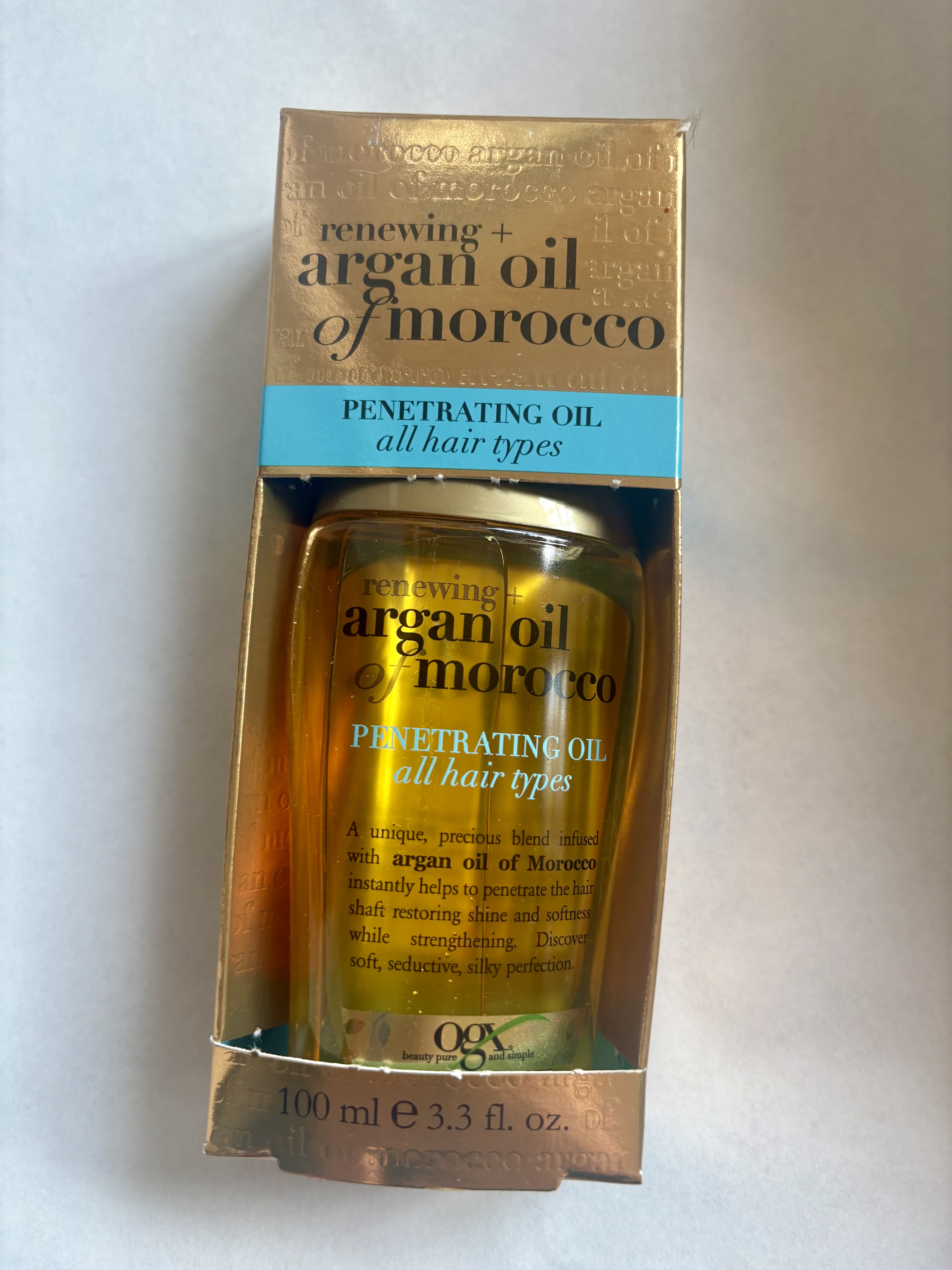 OGX Renewing + Argan Oil of Morocco, Cold-Pressed Argan Oil for Hair Penetrating Treatment & Shine, Moisturizing & Strengthening Silky Oil for All Hair Types, Paraben & Sulfate Free, 3.3 fl oz